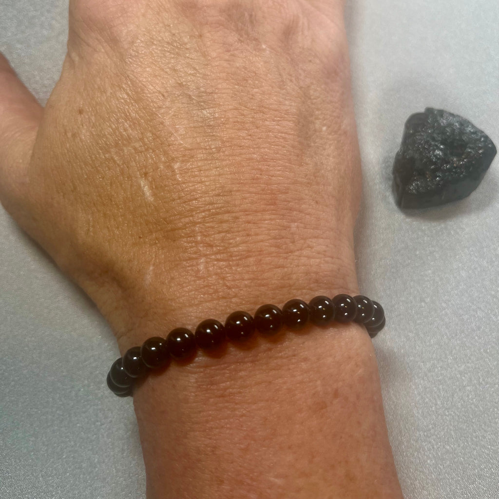 Black Tourmaline (Schorl) smooth round 6mm bead stretch bracelet (premium); October birthstone