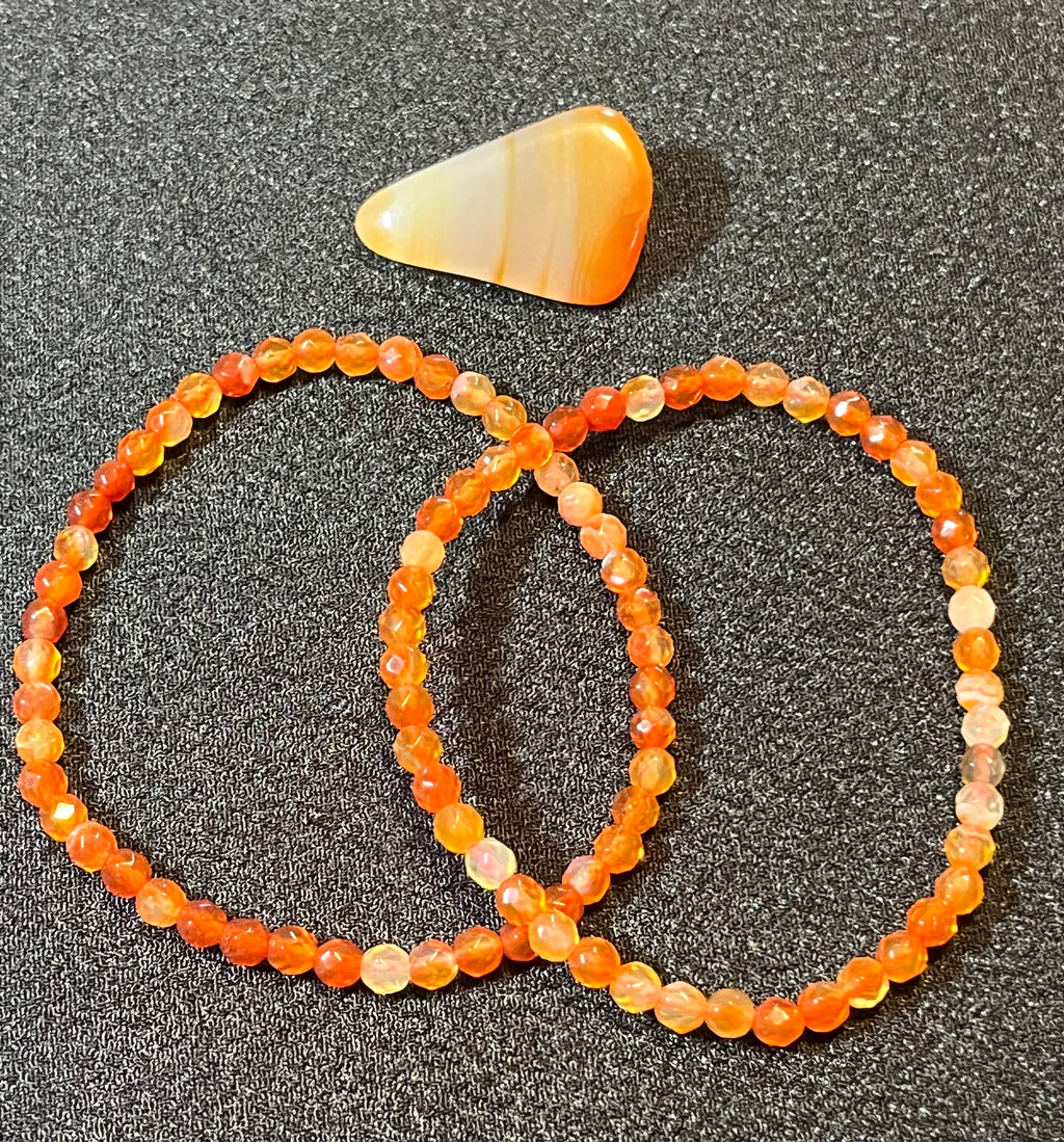 Carnelian (multi-orange) faceted round 4mm bead stretch bracelet; July birthstone