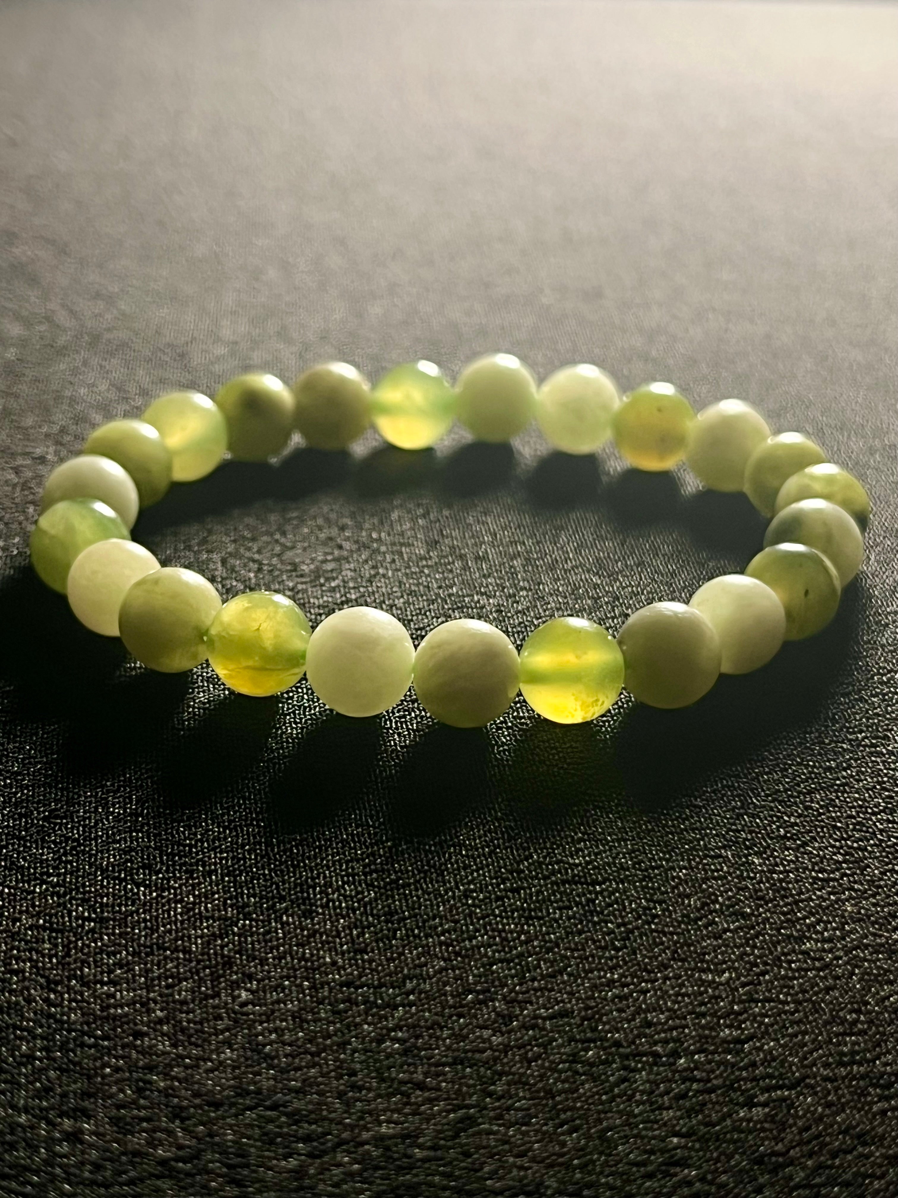 Green & White Jade smooth round 8mm bead stretch bracelet