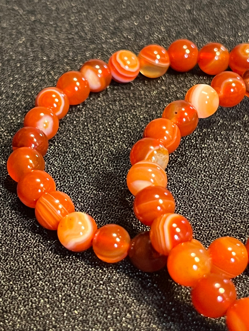 Carnelian (dark orange) smooth round 6mm bead stretch bracelet; July birthstone
