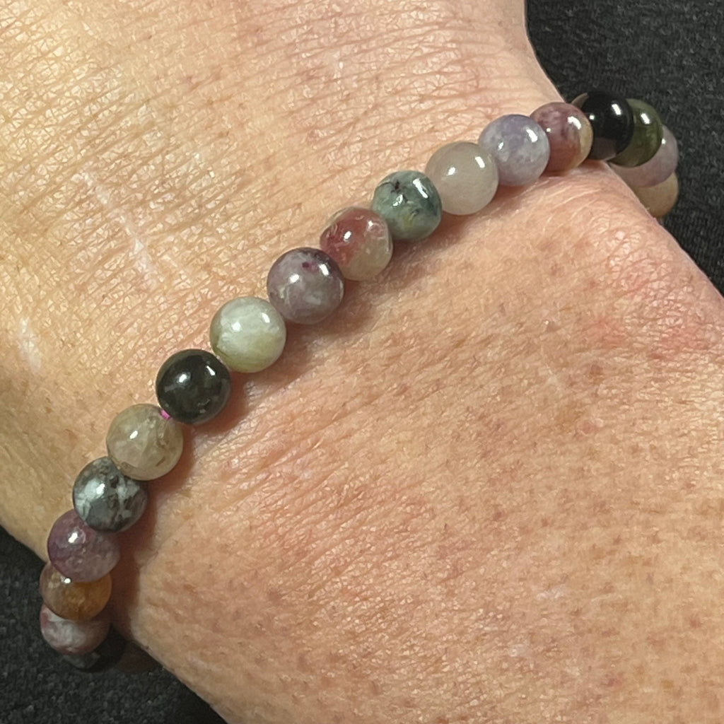 Tourmaline smooth round 6mm bead stretch bracelet; October birthstone