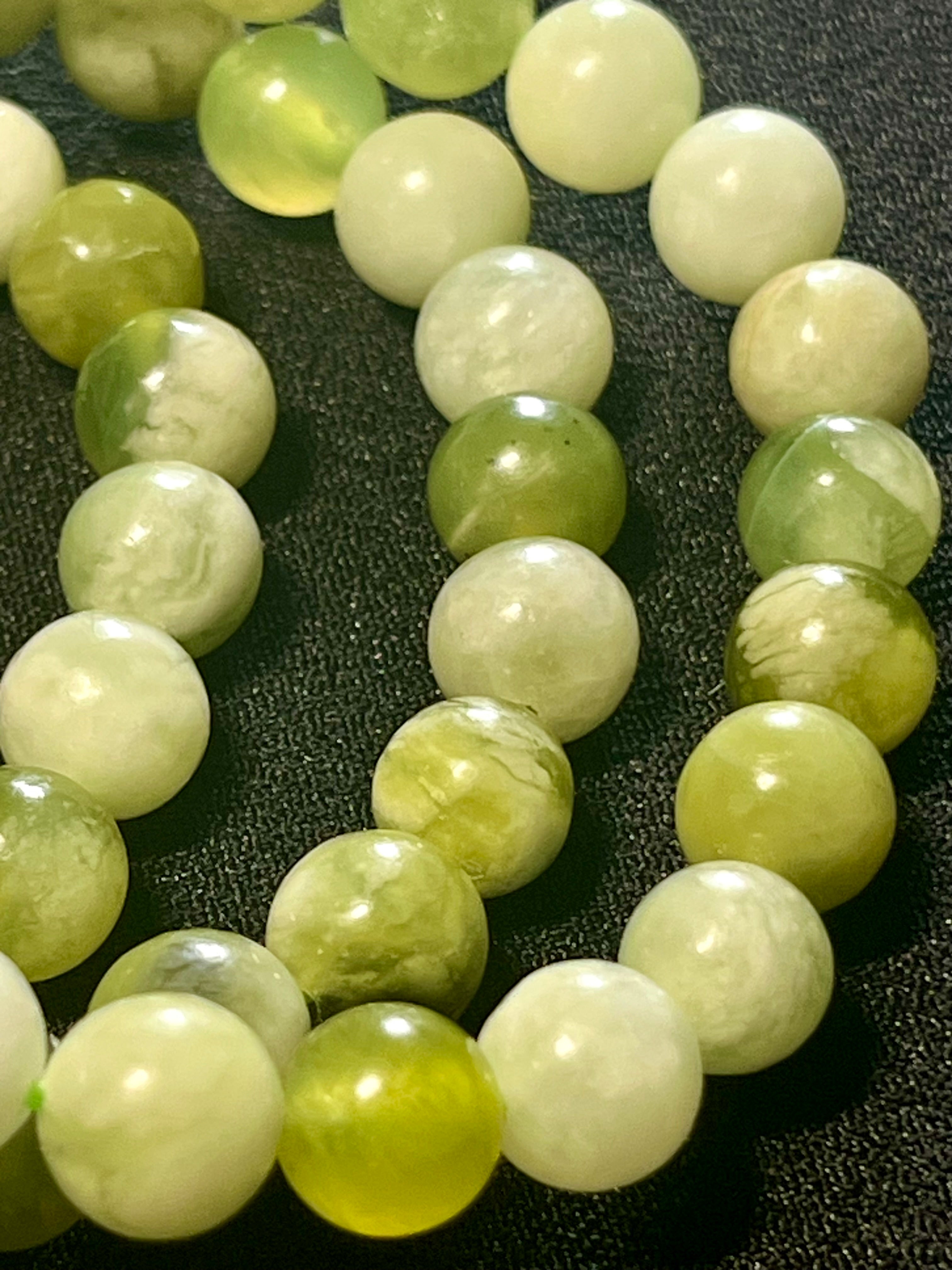Green & White Jade smooth round 8mm bead stretch bracelet
