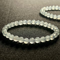 Aquamarine smooth round 6mm bead stretch bracelet; March birthstone