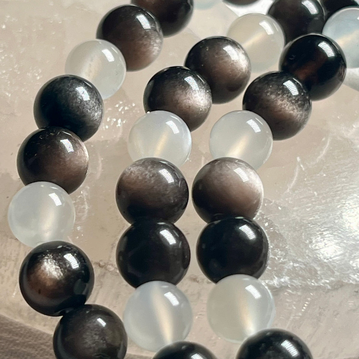 High-quality Silver Sheen Obsidian & White Moonstone smooth round 6mm bead stretch bracelet