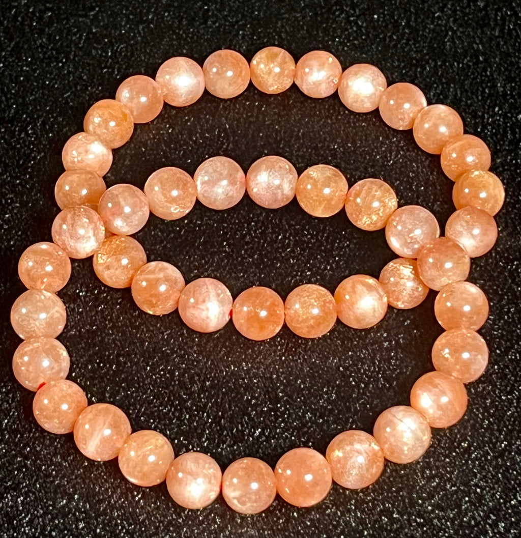 Sunstone w/ Moonstone adularescence flash smooth round 8mm bead stretch bracelet (AAA grade)