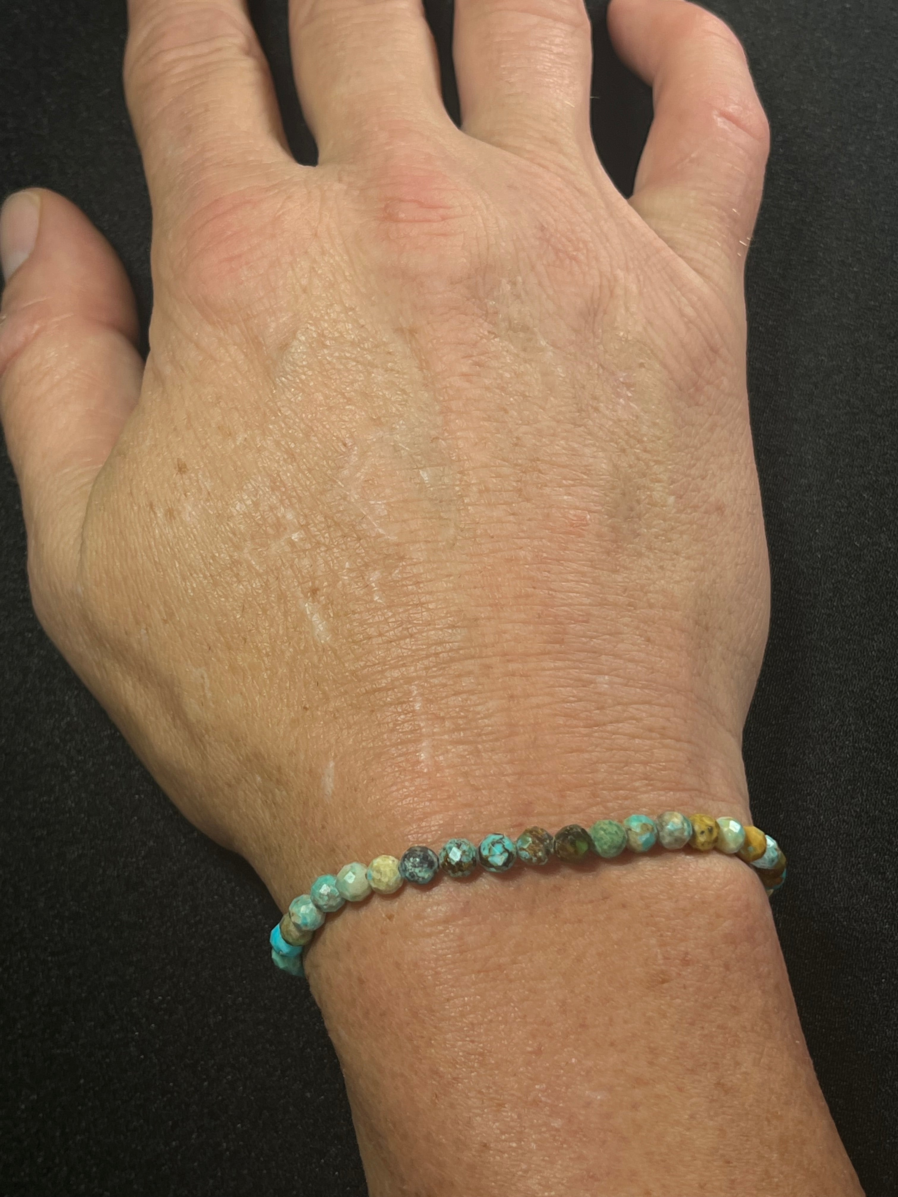 Turquoise gradient color style faceted round 5mm bead stretch bracelet; December birthstone