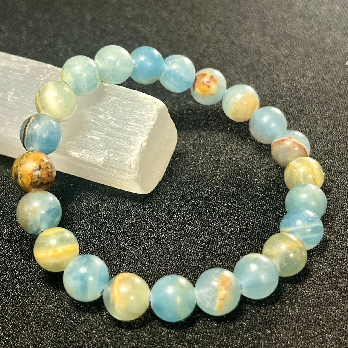 Argentina Blue Calcite smooth round 8mm bead stretch bracelet (AAA grade)