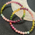 High-quality Multi-Tourmaline ombre-style smooth round 6mm bead stretch bracelet