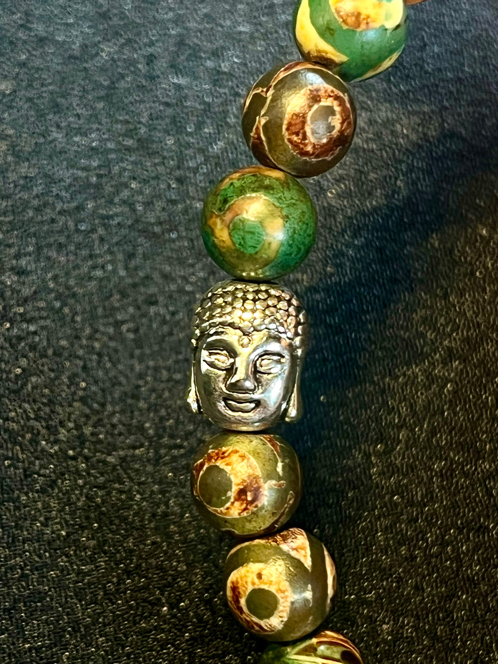 Tibetan Green Eye Agate (dzi) Matte smooth round 8mm bead stretch bracelet w/ silver Buddha accent bead.