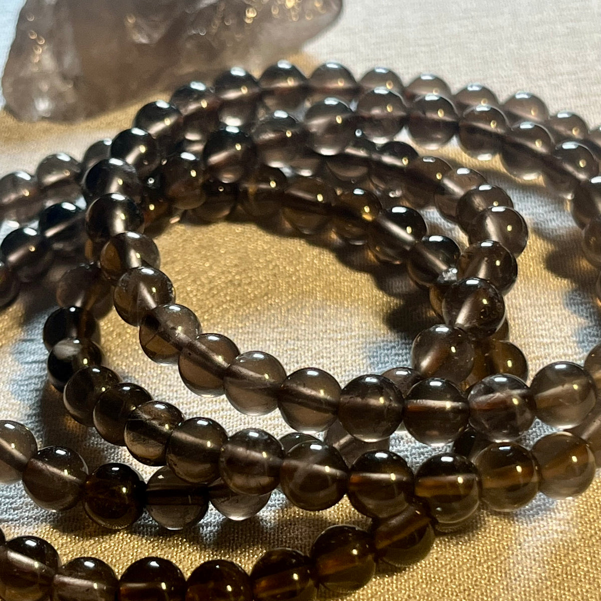 Smoky Quartz smooth round 6mm bead stretch bracelet (AA grade)