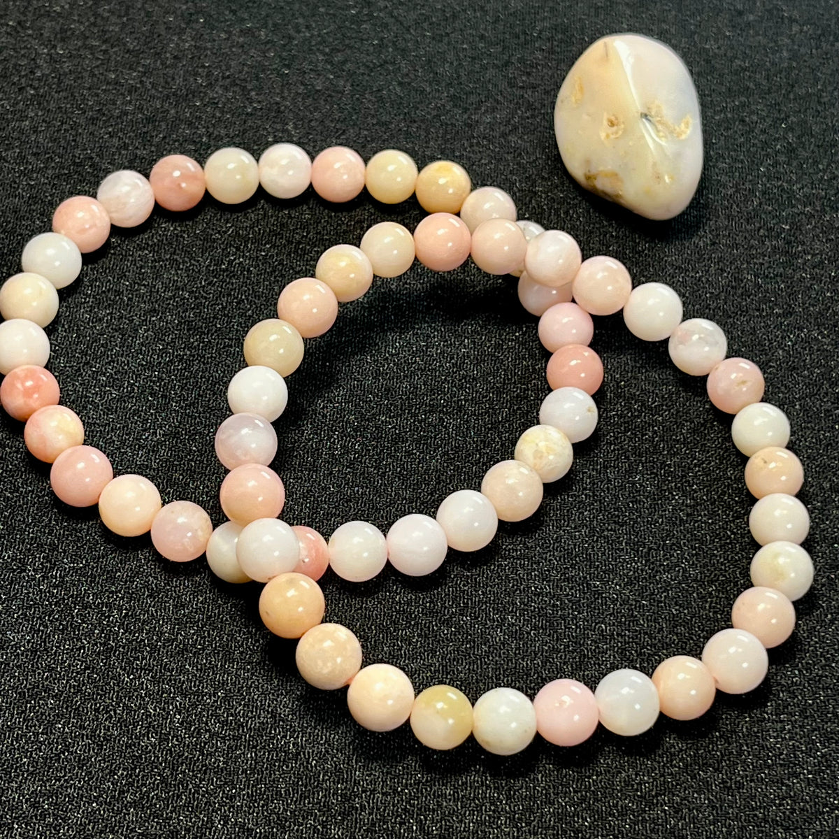 Peruvian Pink Opal smooth round 6.5mm bead stretch bracelet