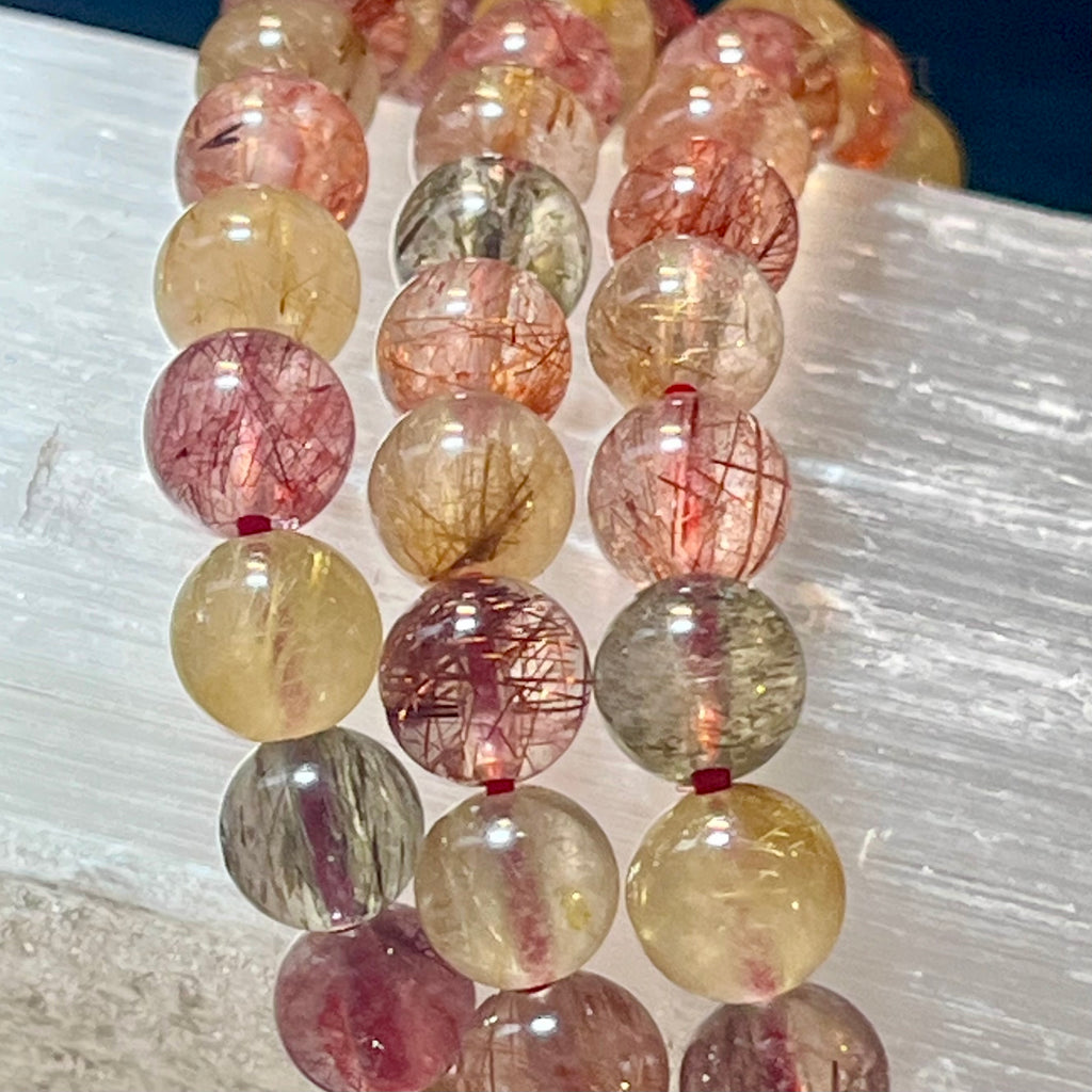 Strawberry, Golden, & Green Rutilated Quartz smooth round 7mm bead stretch bracelet