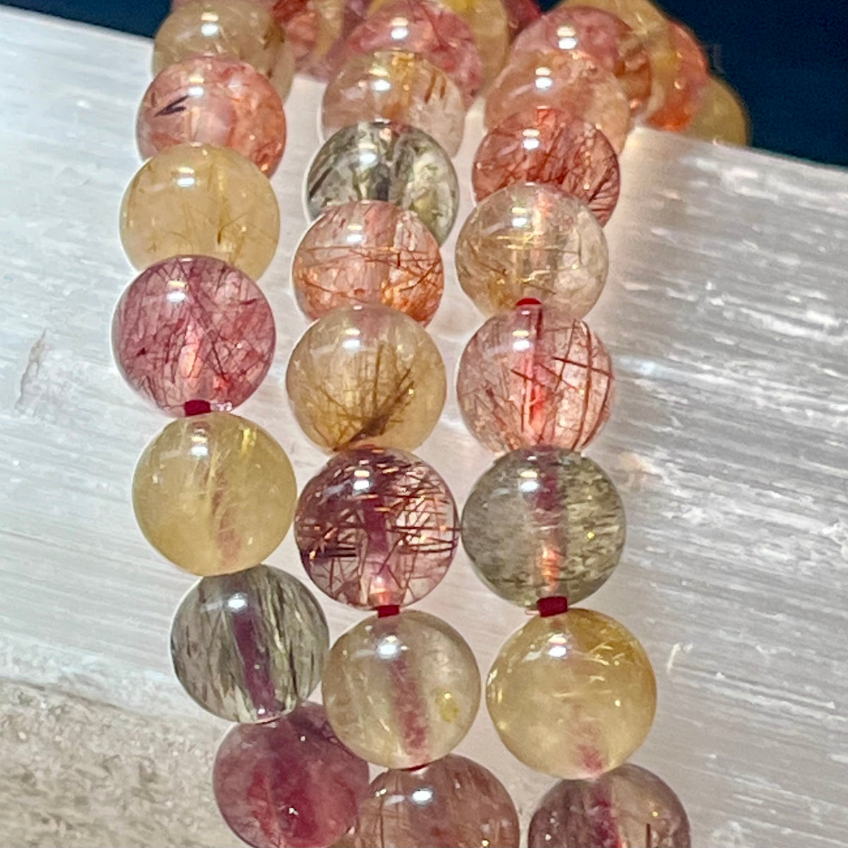 Strawberry, Golden, & Green Rutilated Quartz smooth round 7mm bead stretch bracelet