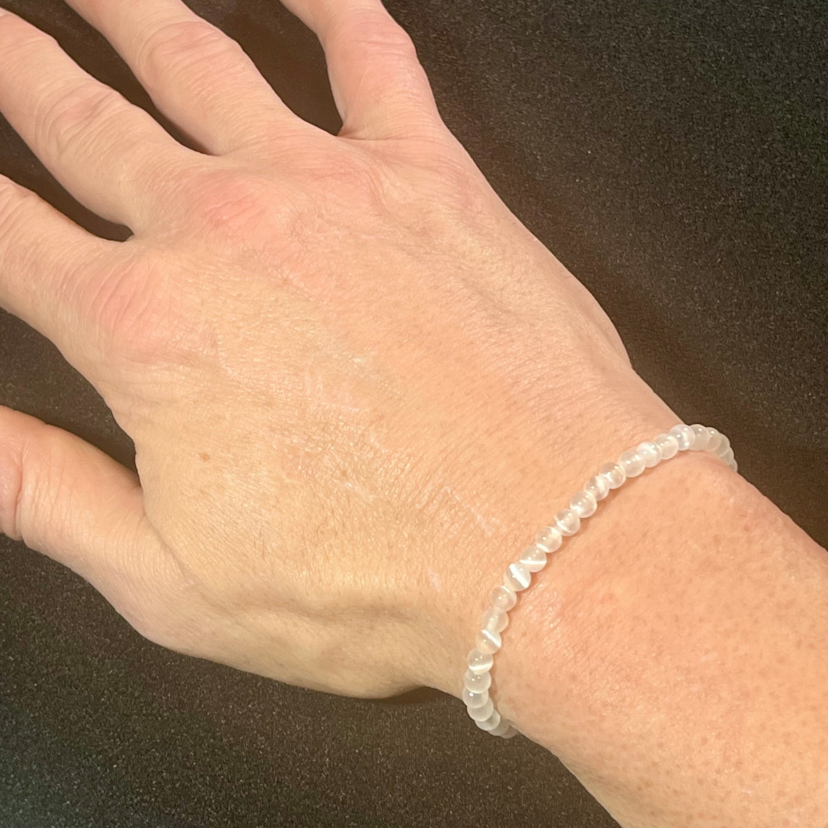 Selenite smooth round 4mm single stretch bracelet