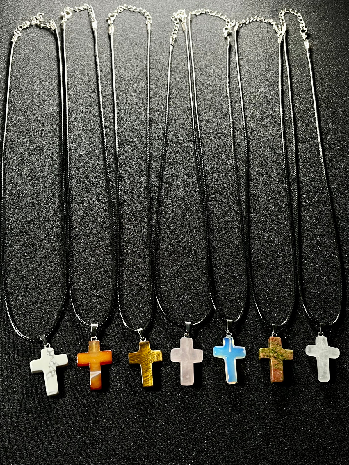 Christian gemstone cross adjustable necklaces w/ 19 1/2” black waxed necklace cord - Howlite, Carnelian Agate, Tiger’s Eye, Rose Quartz, Opalite, Unakite, and Clear Crystal Quartz