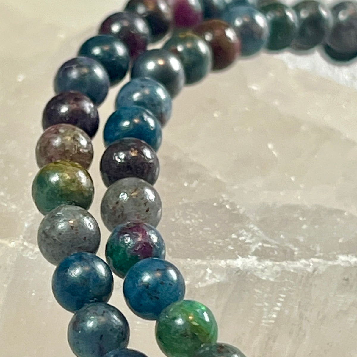 Ruby Kyanite smooth round small 4mm bead stretch bracelet; Ruby- traditional July birthstone