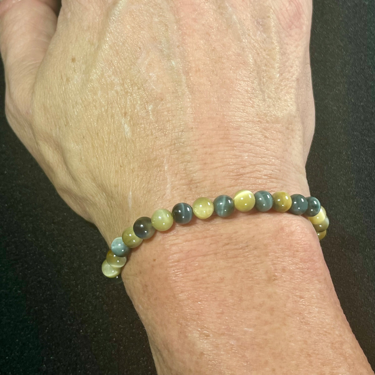 Blue & Golden Tiger’s Eye smooth round 4mm, 6mm, and 8mm bead stretch bracelet