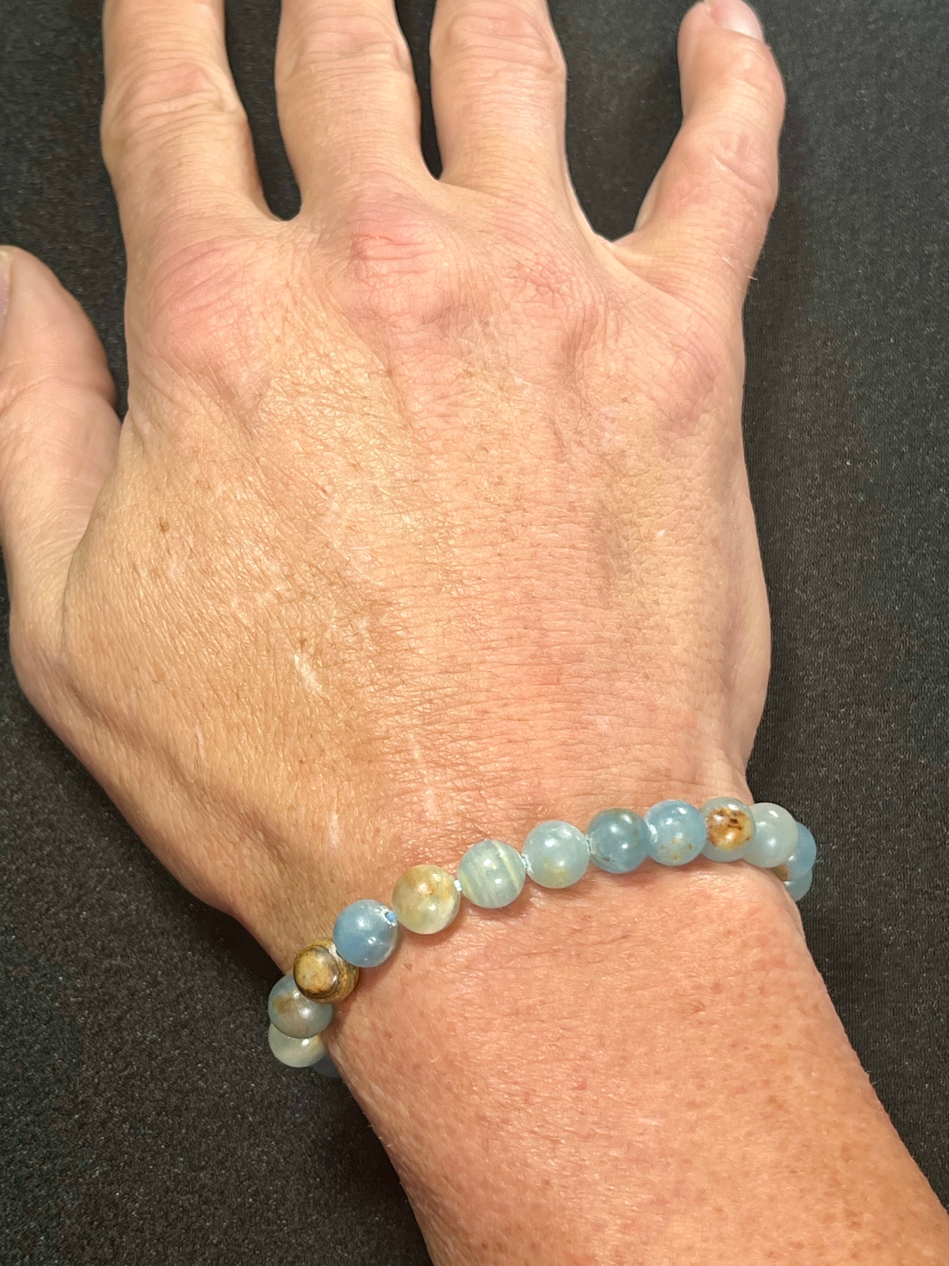 Argentina Blue Calcite smooth round 8mm bead stretch bracelet (AAA grade)