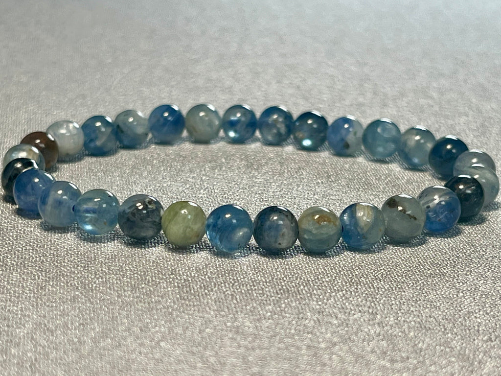 Blue Kyanite Mix smooth round 6mm bead stretch bracelet