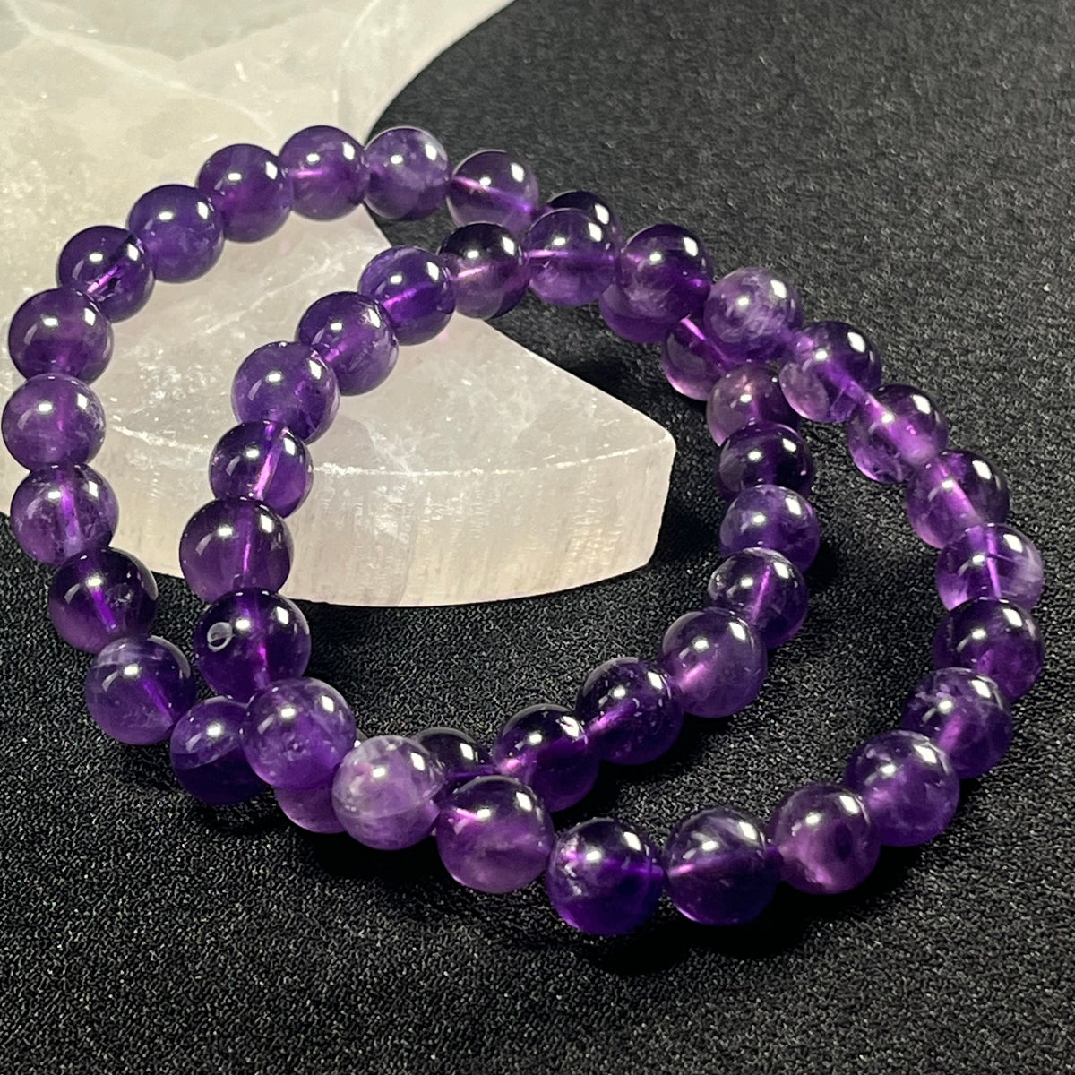 Amethyst smooth round 8mm bead stretch bracelet; February birthstone