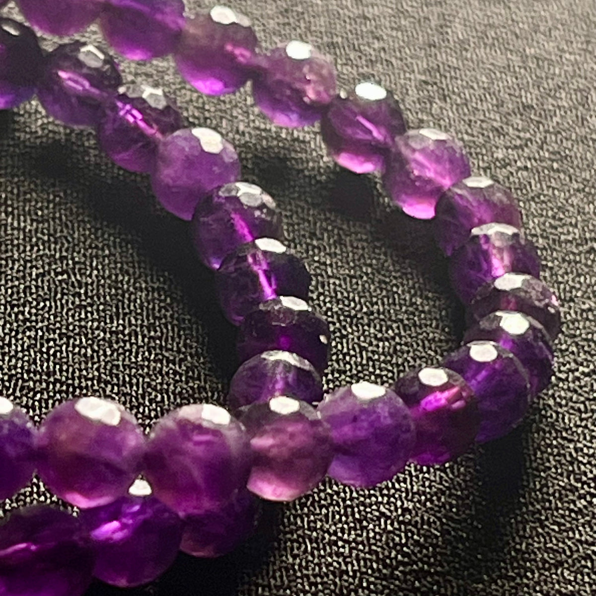 Amethyst (dark) faceted round 6mm bead stretch bracelet w/4mm microfaceted Clear Quartz spacer