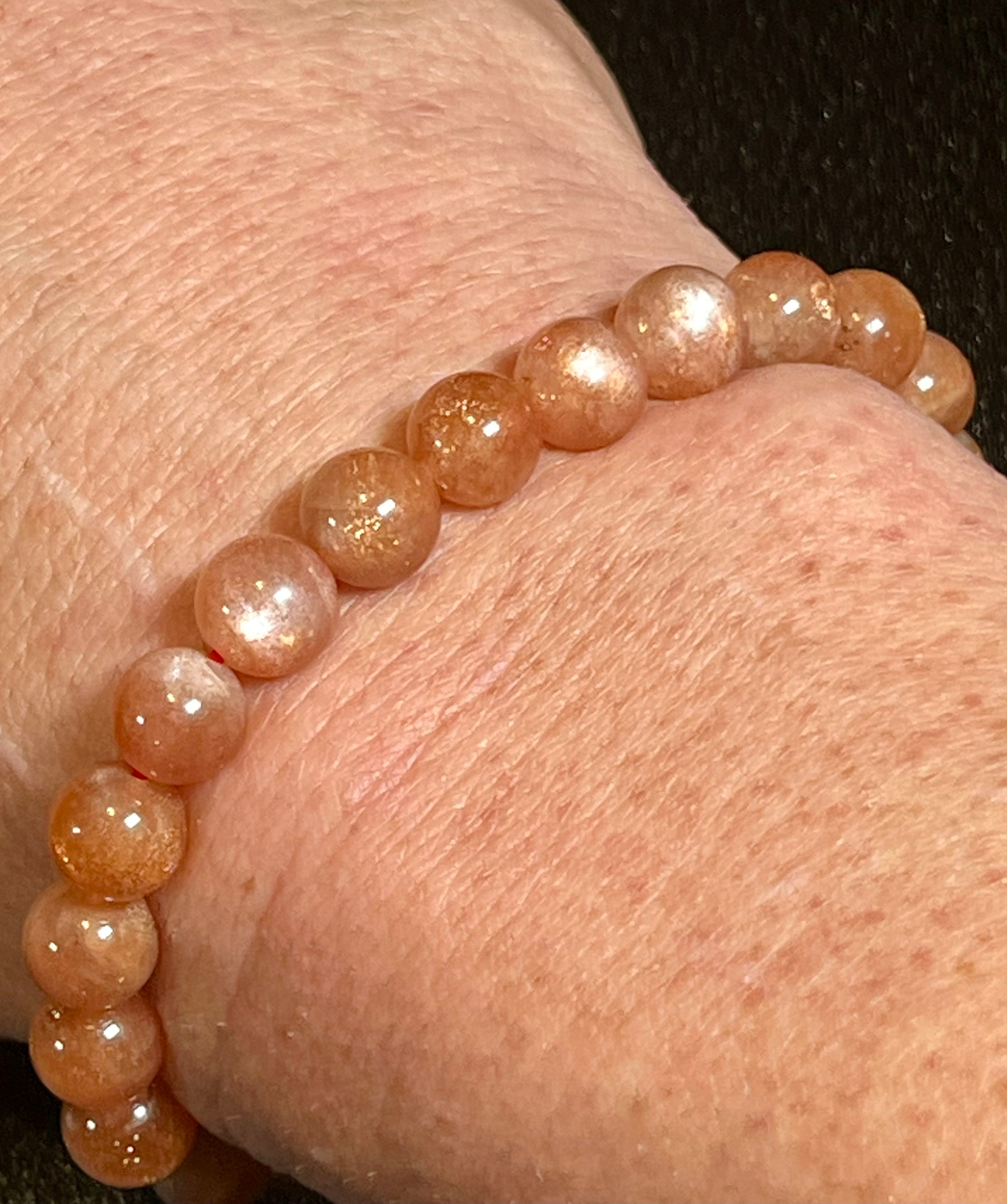Sunstone w/ Moonstone adularescence flash smooth round 8mm bead stretch bracelet (AAA grade)