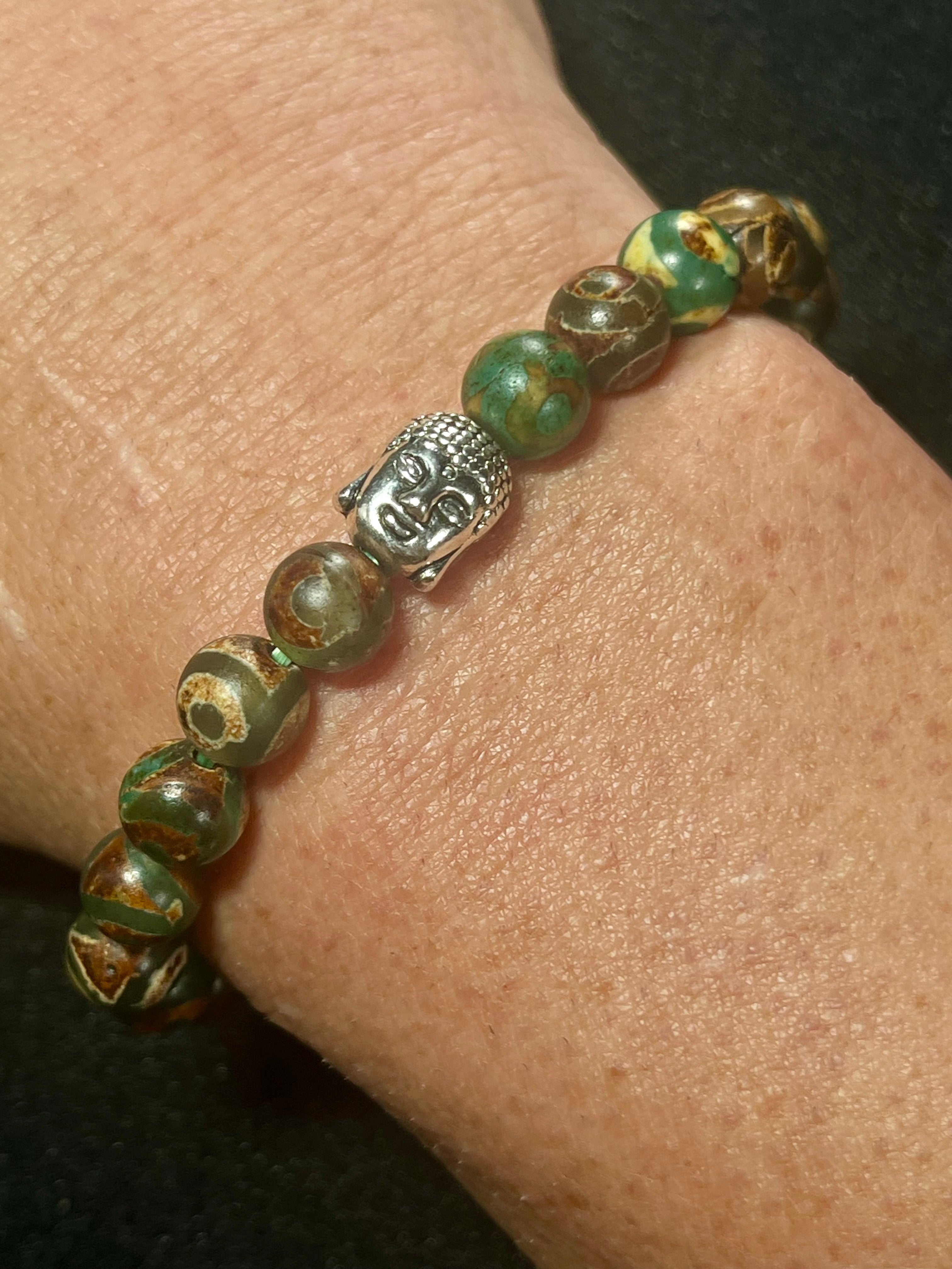 Tibetan Green Eye Agate (dzi) Matte smooth round 8mm bead stretch bracelet w/ silver Buddha accent bead.