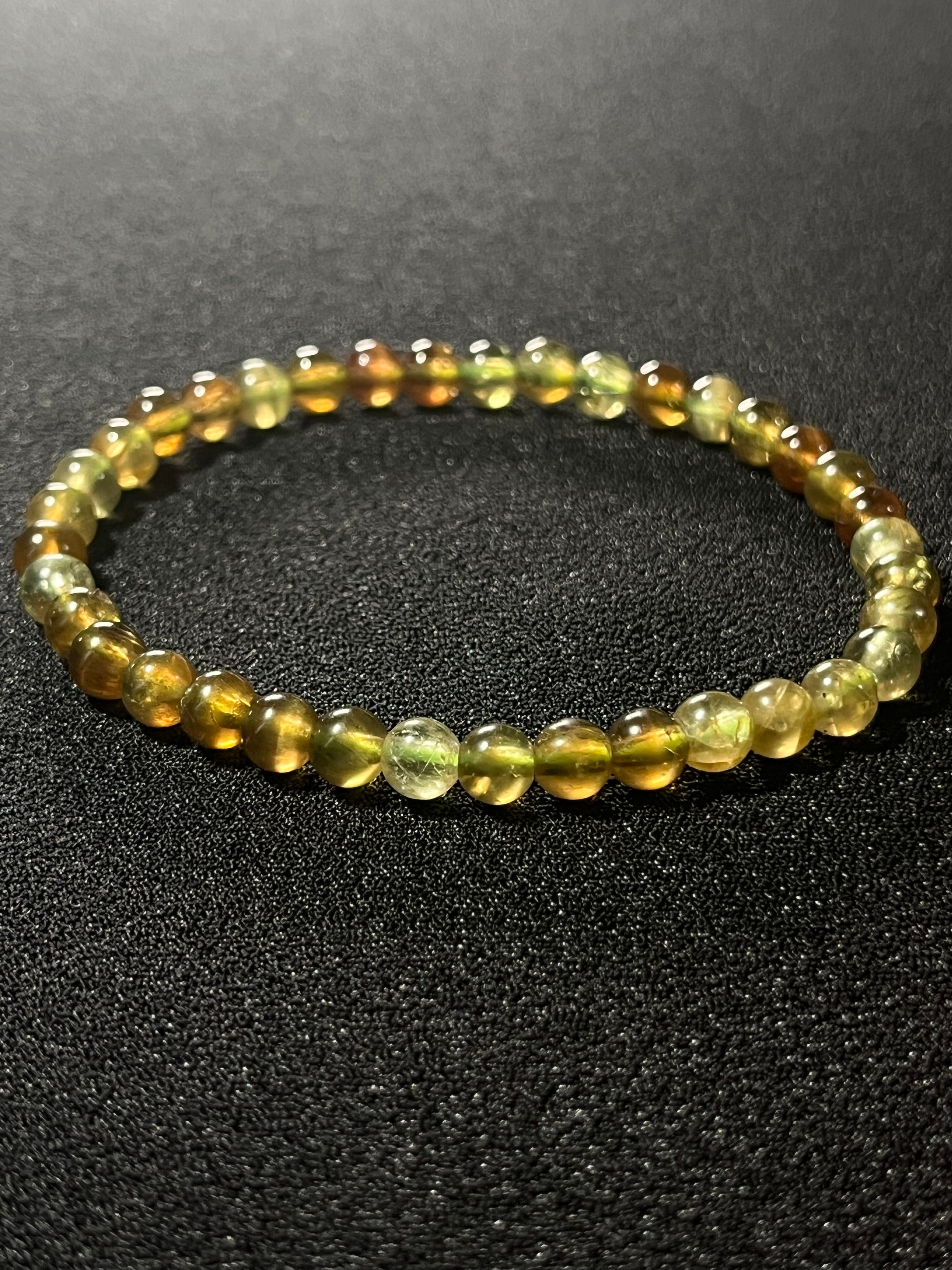 RARE Green Tsavorite Garnet smooth round 5mm bead stretch bracelet (AA grade)