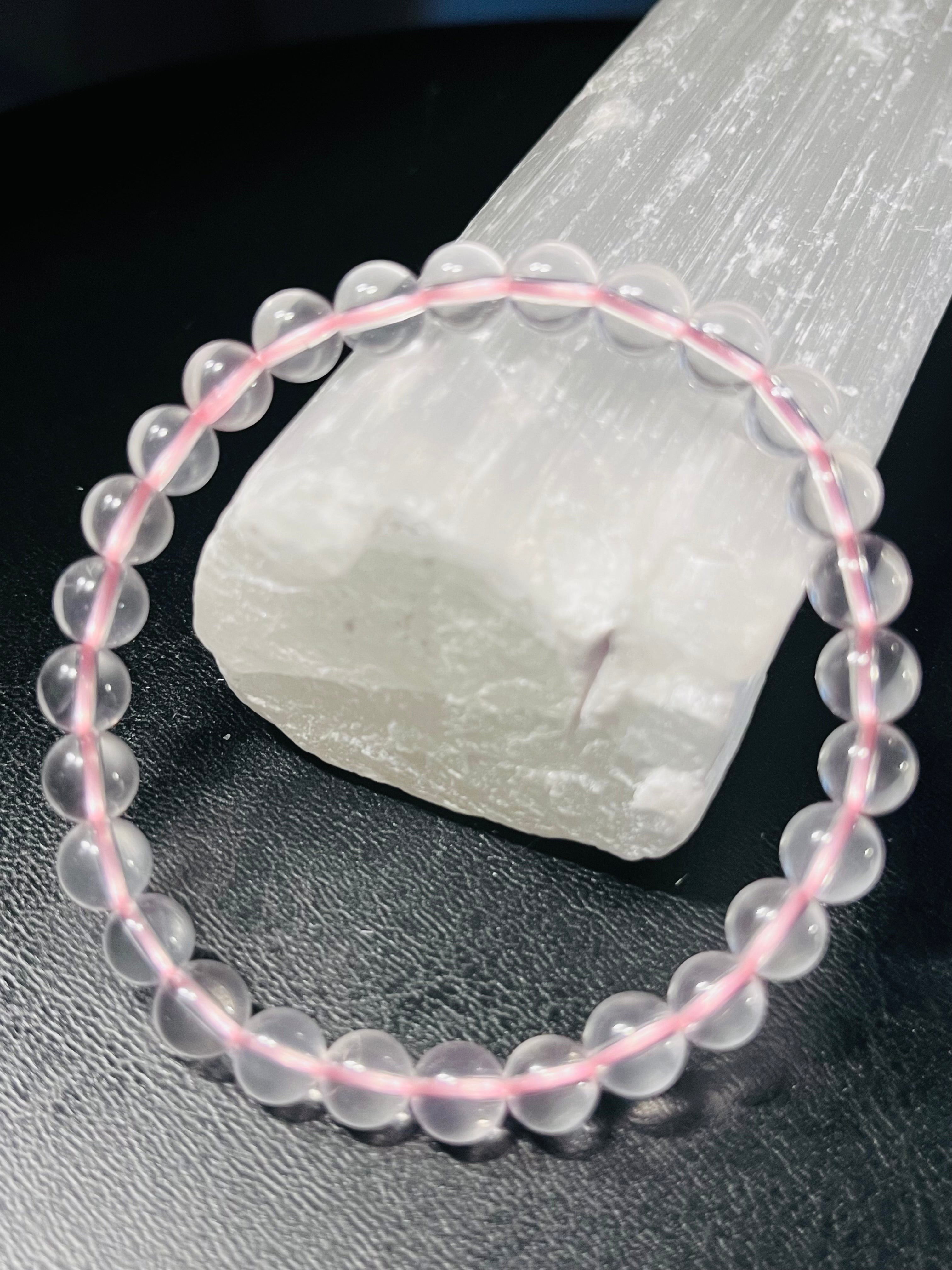 Light Pink Mozambique Rose Quartz smooth round 6.5mm bead stretch bracelet (AAA grade); October birthstone