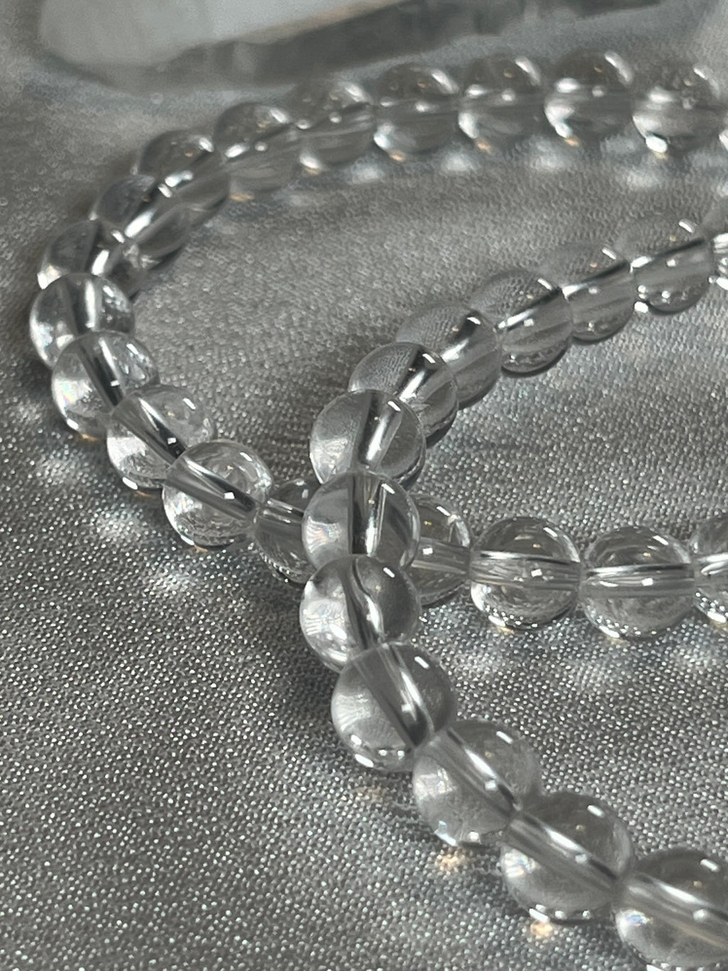 Clear Crystal Quartz smooth round 4mm, 6mm bead stretch bracelet (premium)