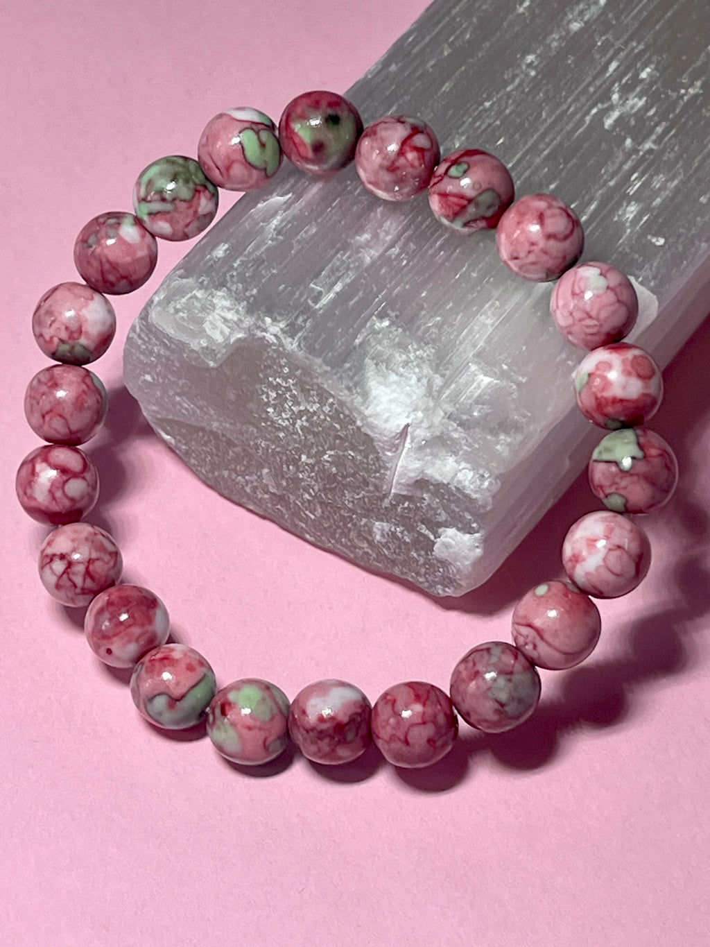 Rain Flower Rhyolite smooth round 8mm bead stretch bracelet (dyed)