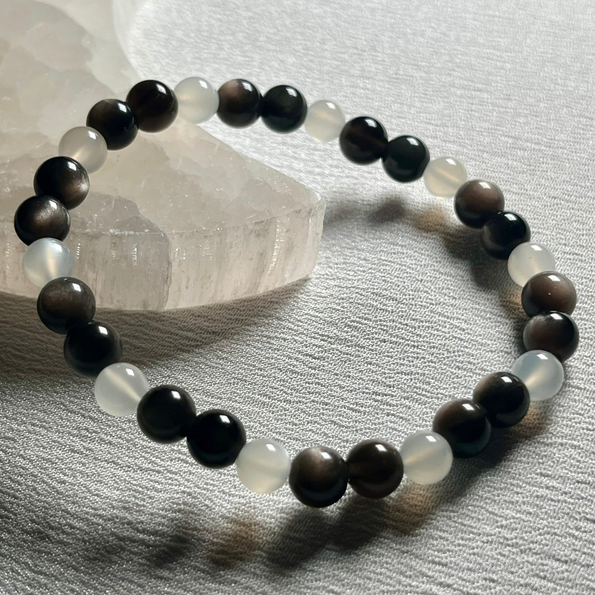 High-quality Silver Sheen Obsidian & White Moonstone smooth round 6mm bead stretch bracelet