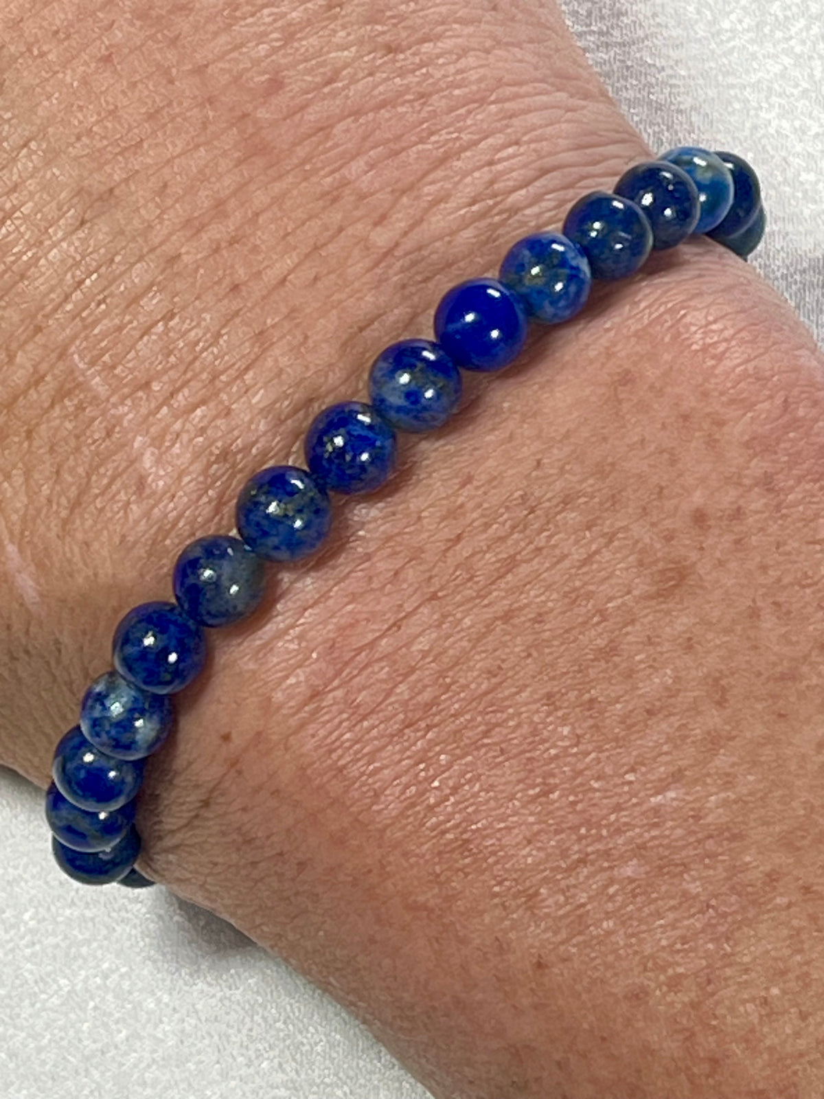 Lapis Lazuli smooth round 6mm bead stretch bracelet (A grade); alternative September birthstone