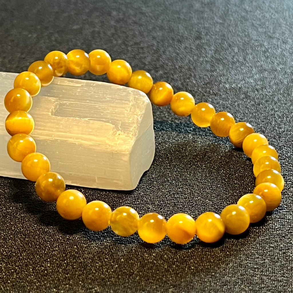 Golden Tiger’s Eye smooth round 4mm and 6mm bead stretch bracelet