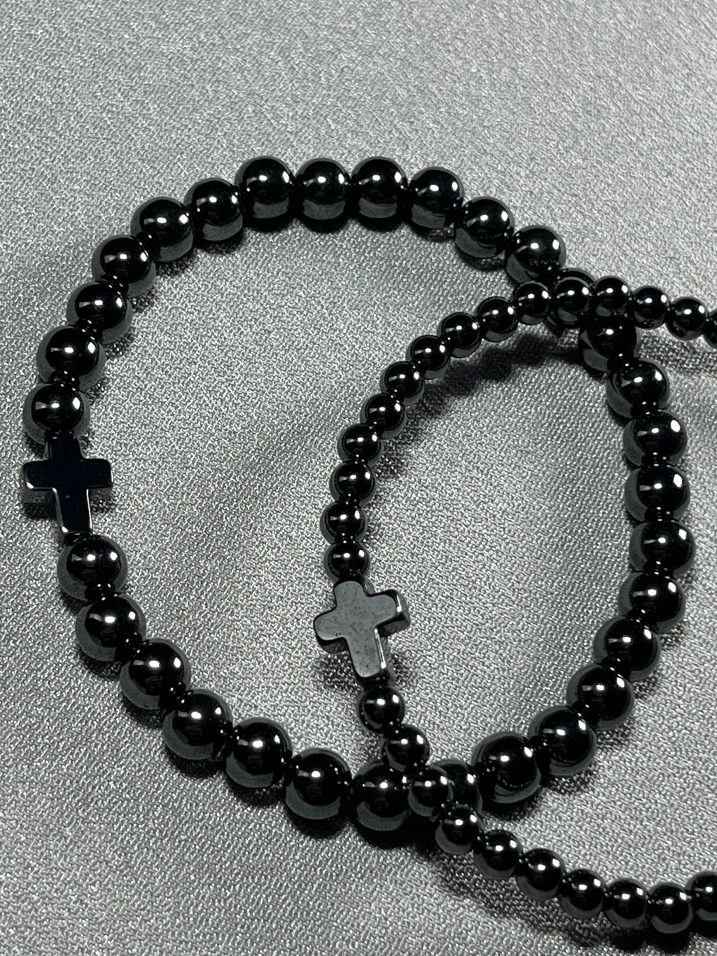 Hematite smooth round 4mm and 6mm bead stretch bracelets w/ Hematite Christian cross focal beads