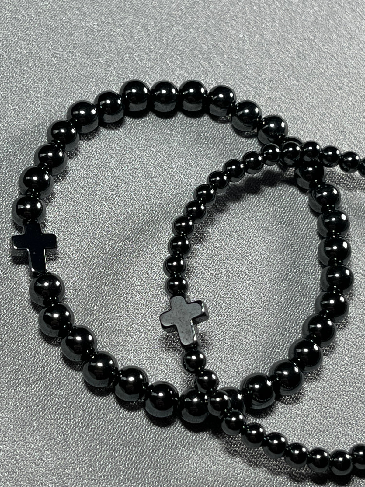 Hematite smooth round 4mm and 6mm bead stretch bracelets w/ Hematite Christian cross focal beads