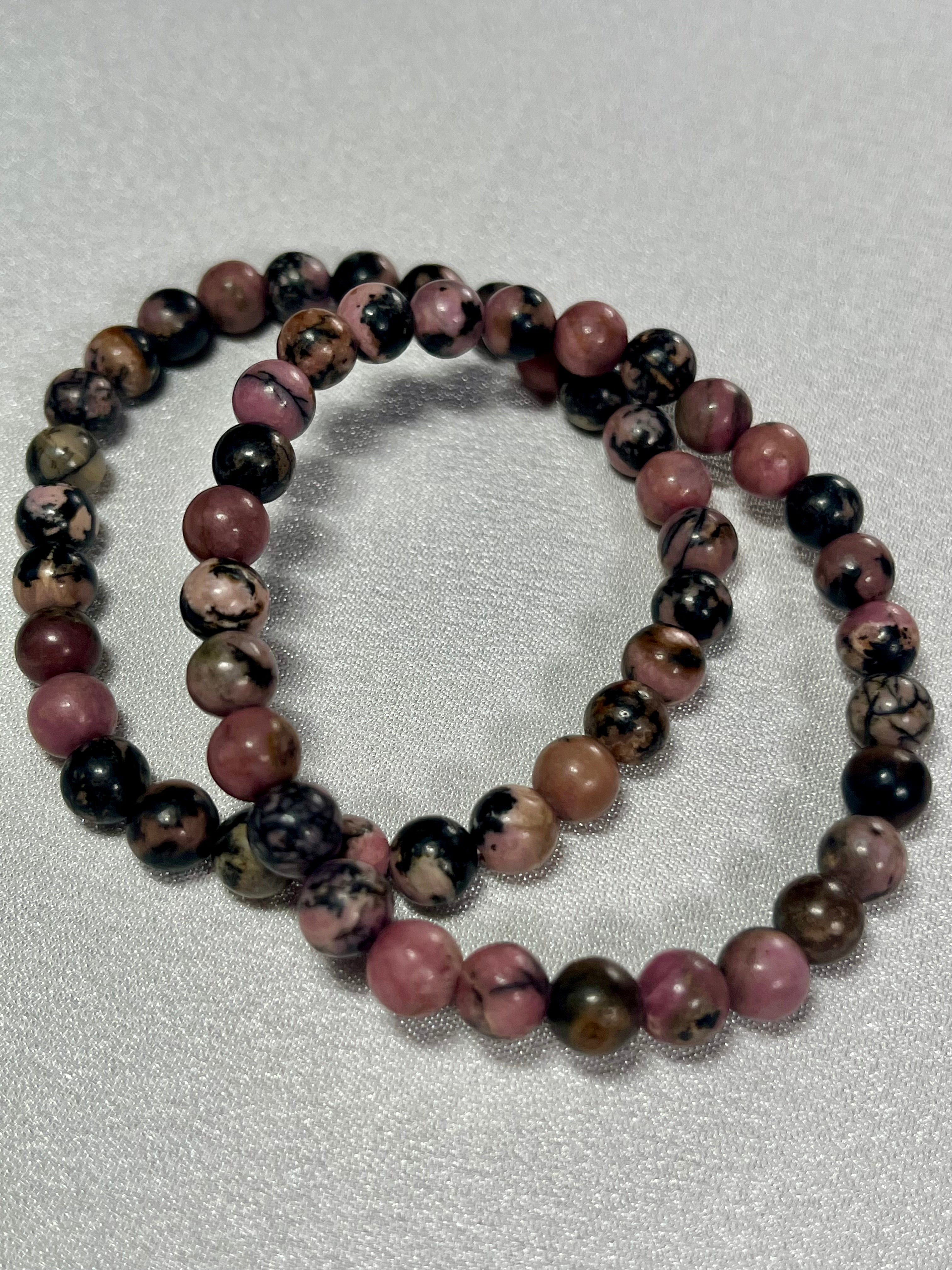 Rhodonite with black matrix smooth round 6mm bead stretch bracelet