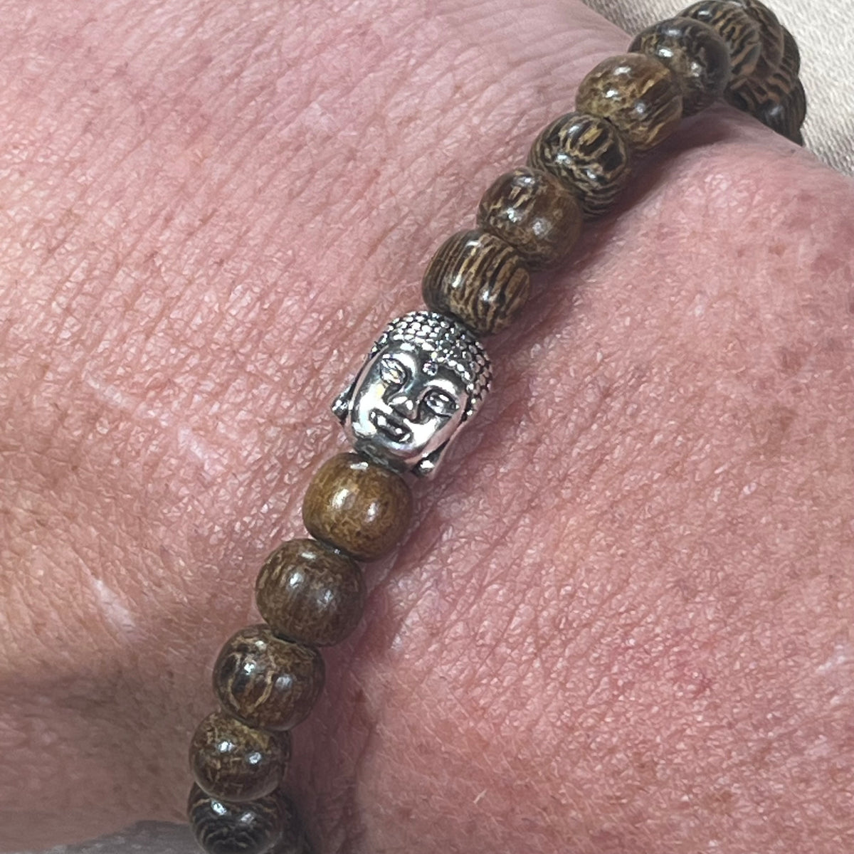 Philippines Robles Wood round 6mm bead stretch bracelet w/ silver Buddha focal