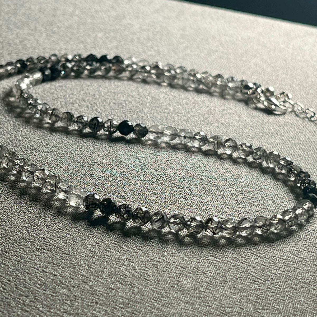 Black Tourmalated Quartz gradient color microfaceted round 4.5mm bead 22” adjustable necklace w/ silver clasp & chain