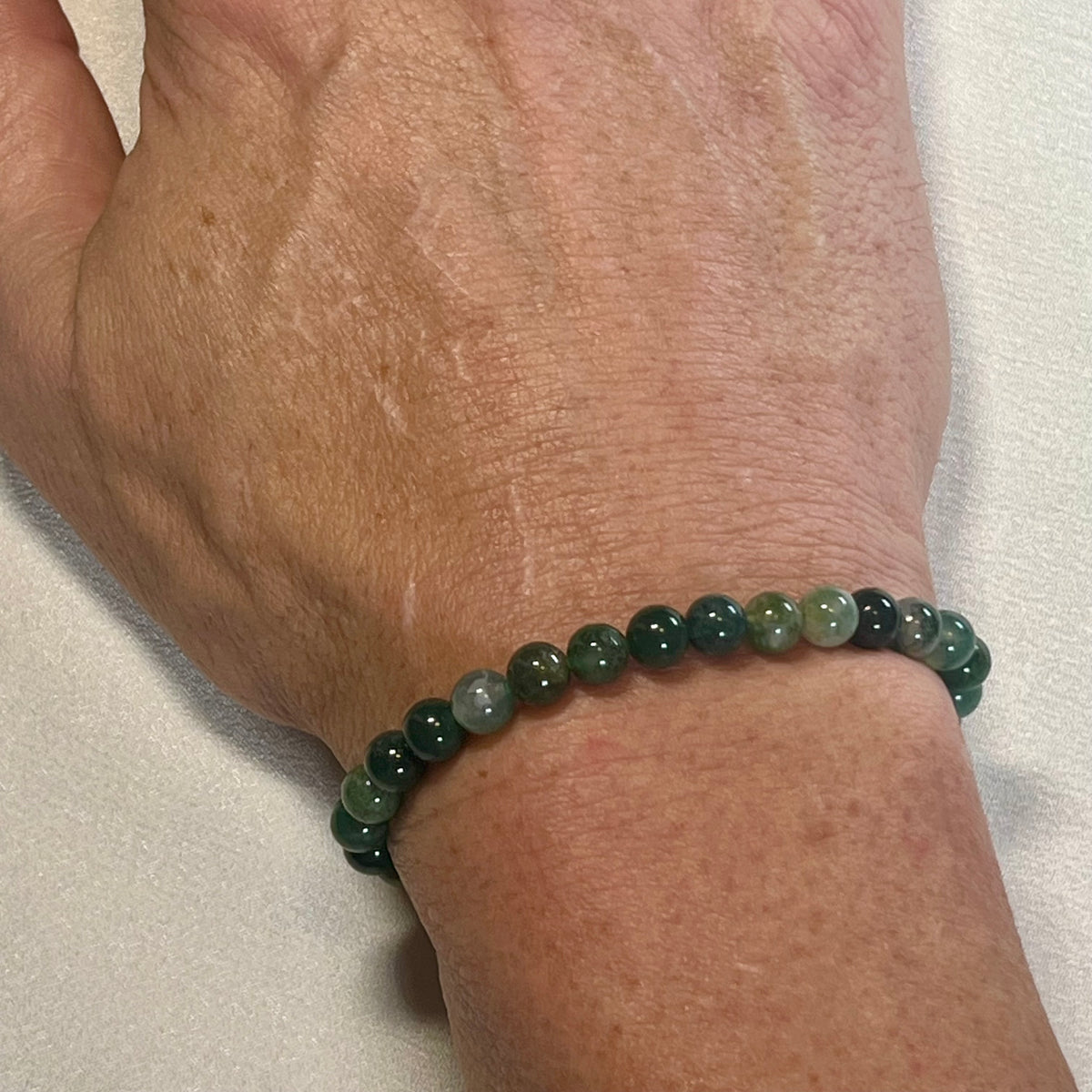 Moss Agate smooth round 4mm, 6.5mm and 8.5mm bead stretch bracelet