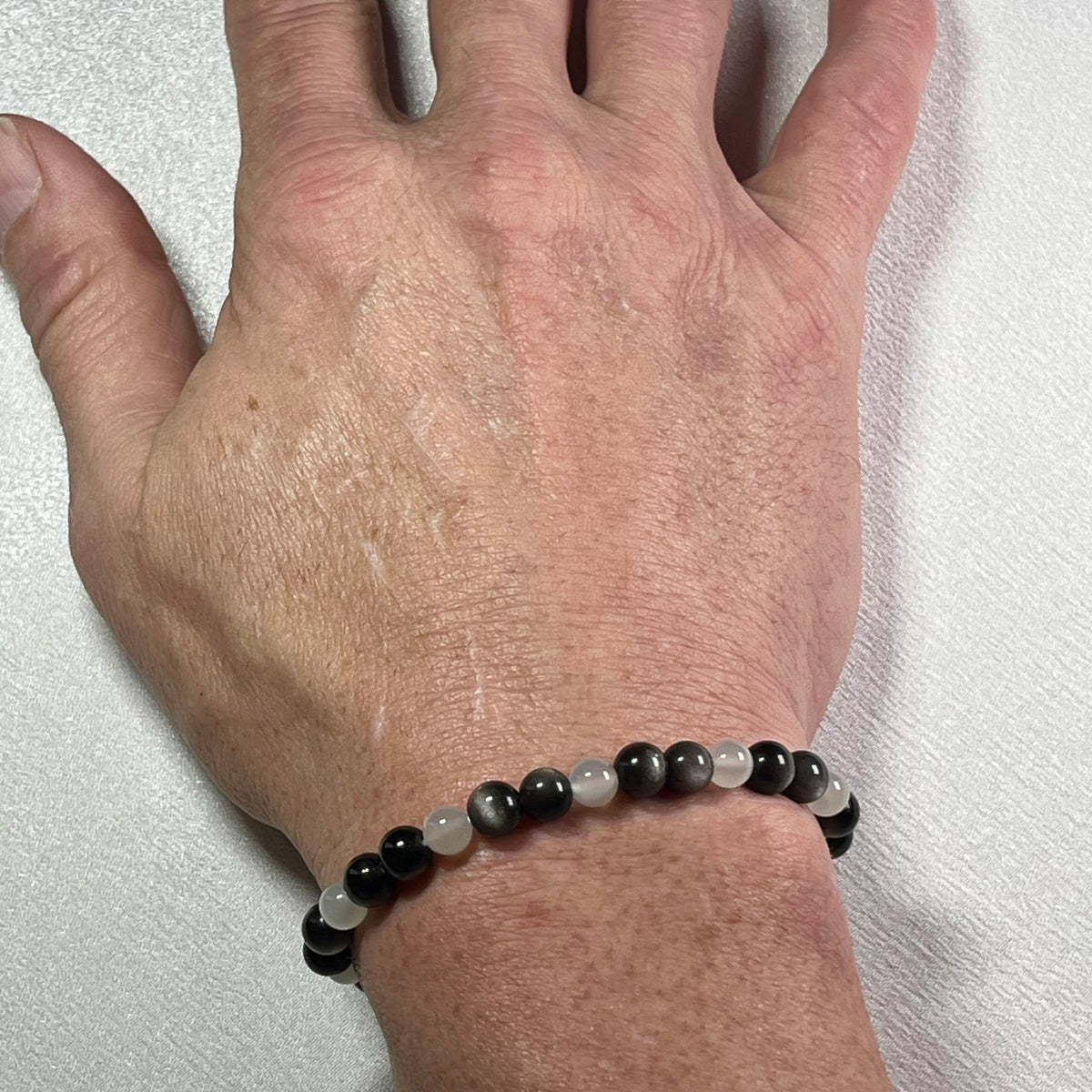 High-quality Silver Sheen Obsidian & White Moonstone smooth round 6mm bead stretch bracelet