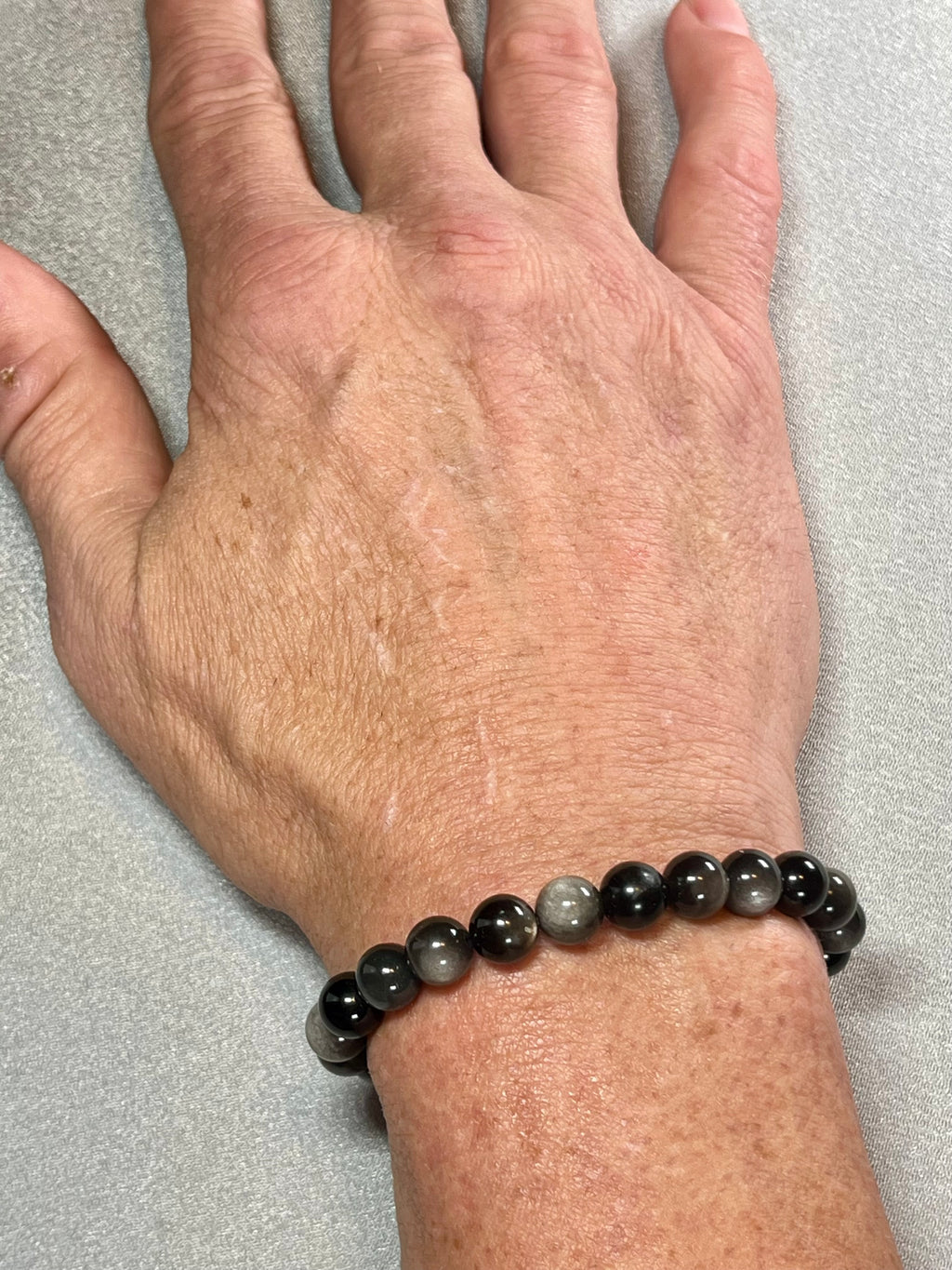 Silver Sheen Obsidian smooth round 8mm bead stretch bracelet