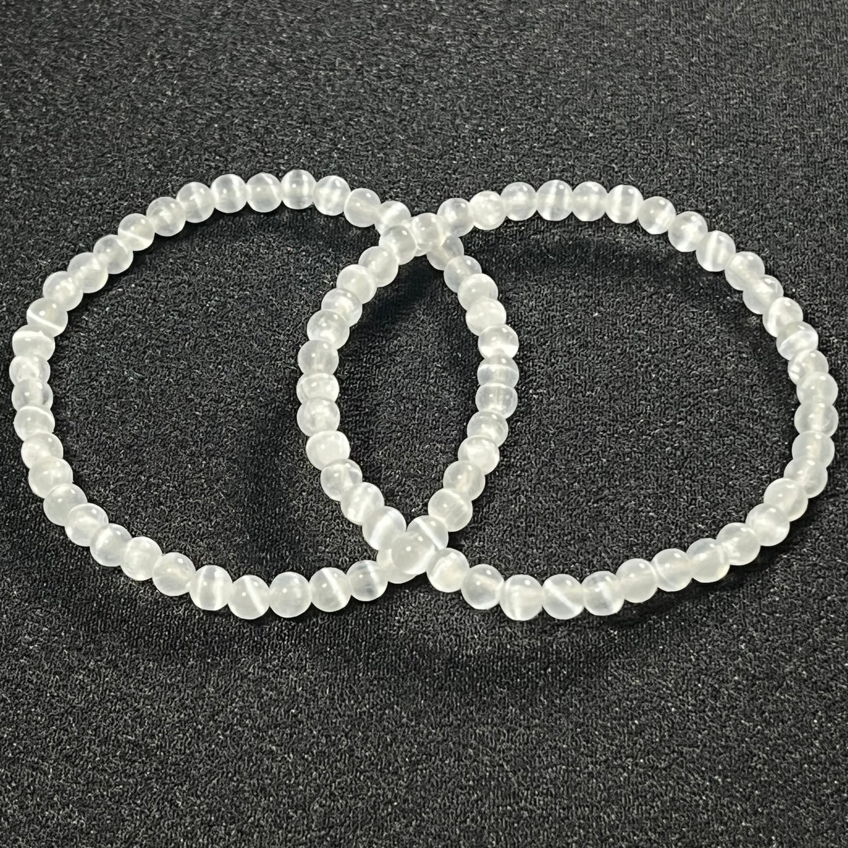 Selenite smooth round 4mm single stretch bracelet