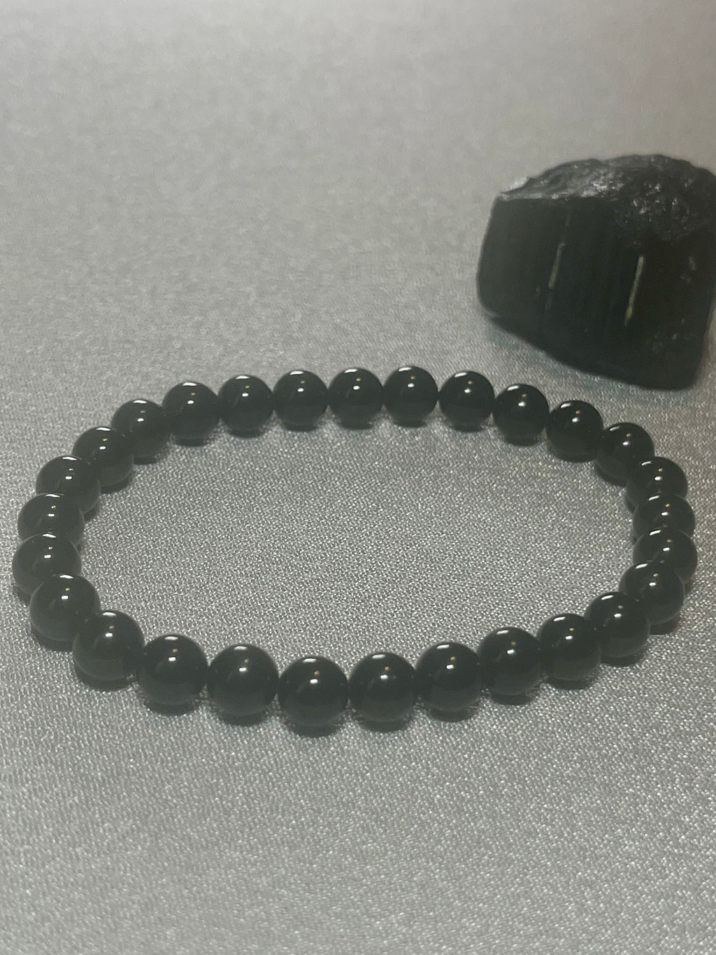 Black Tourmaline smooth round 6mm bead stretch bracelet (premium)