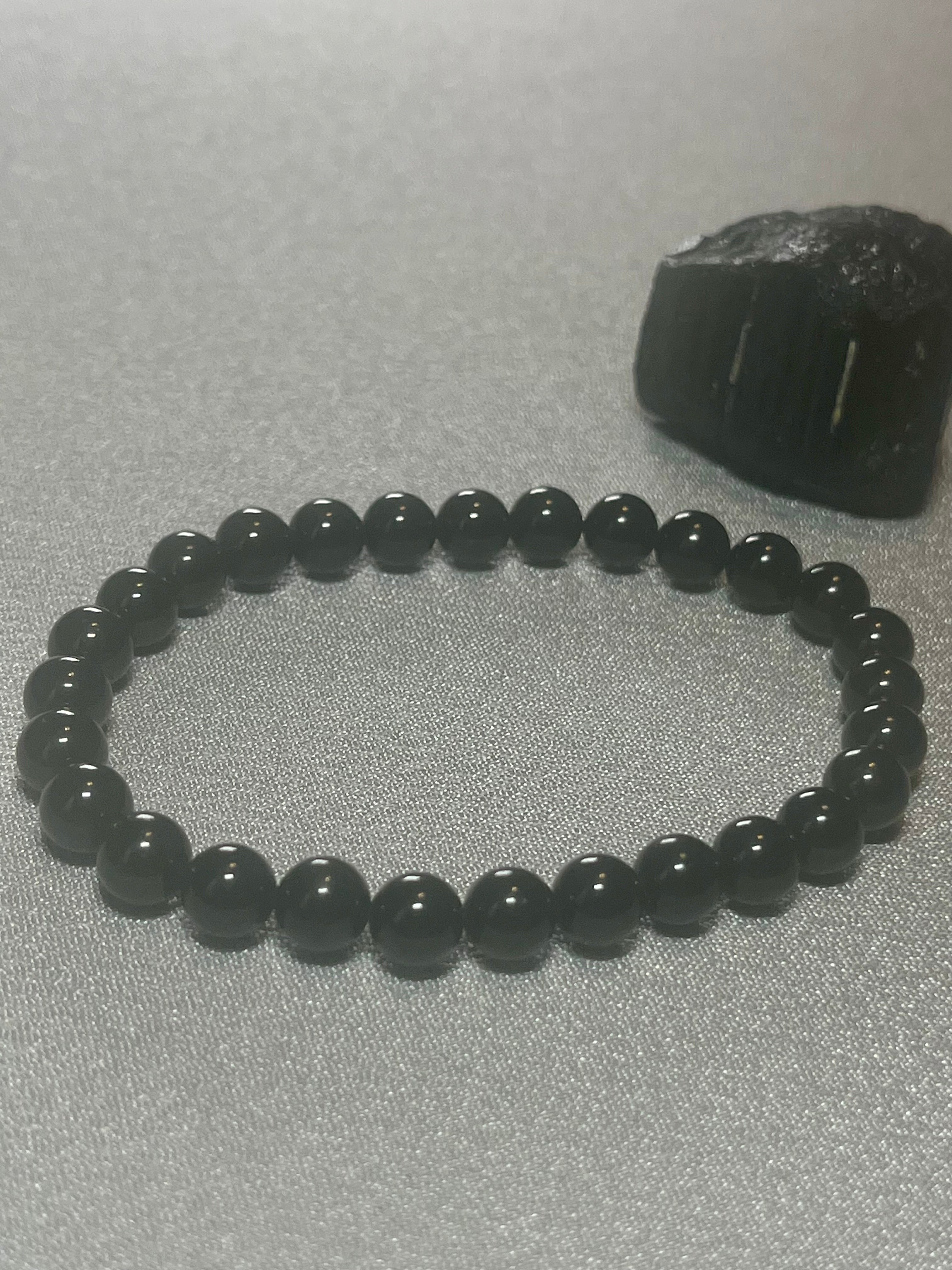 Black Tourmaline smooth round 6mm bead stretch bracelet (premium)