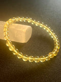 Amber (Light Yellow) w/ 24k gold spacer smooth round 5.5mm bead stretch bracelet
