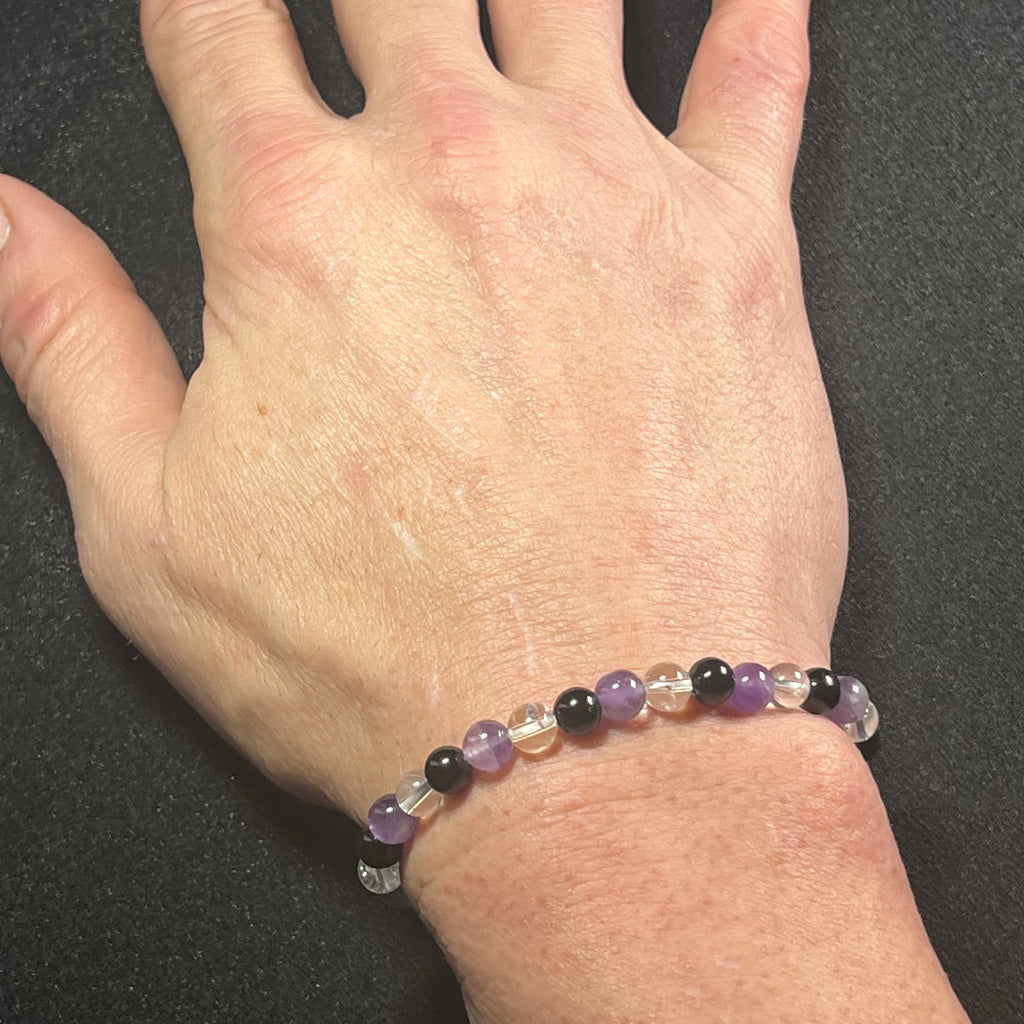 Amethyst, Black Tourmaline, & Rock Crystal Quartz smooth round 6mm bead stretch bracelet