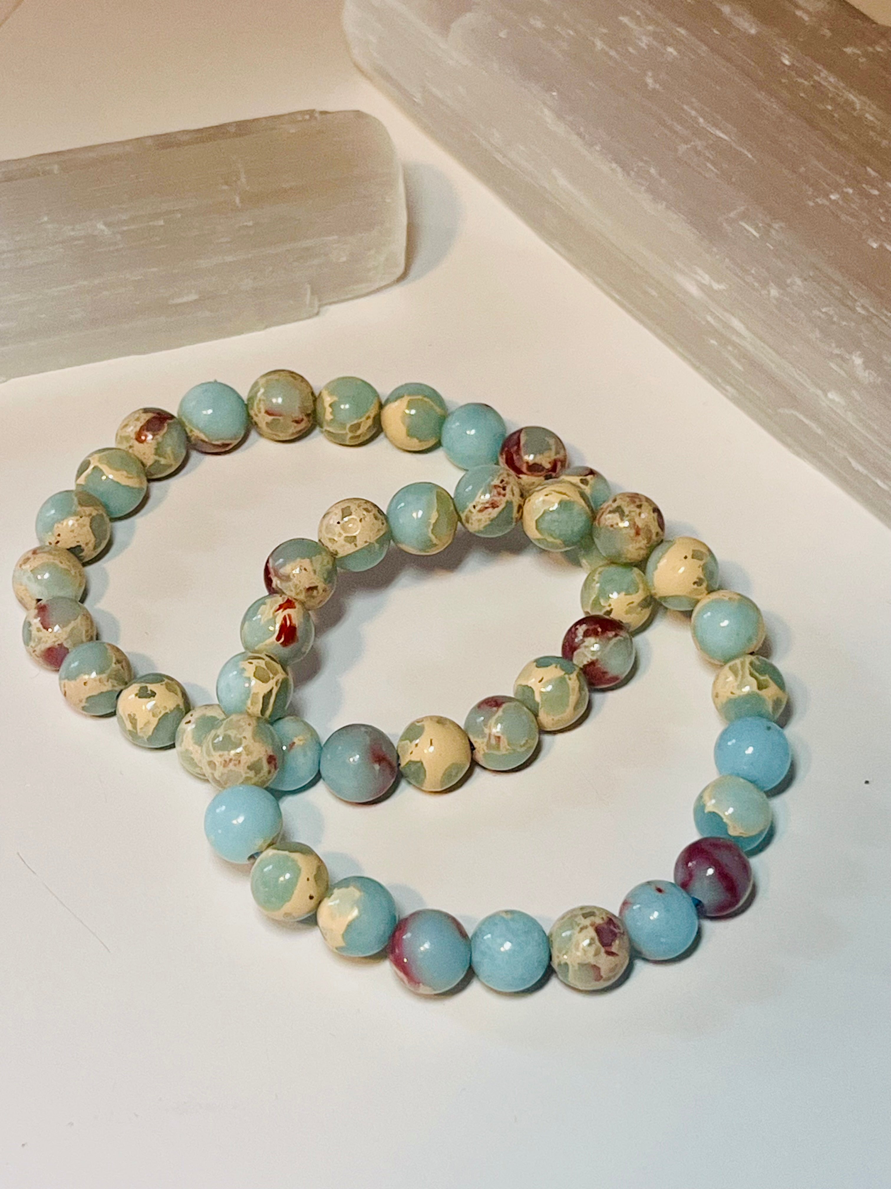 Icy Blue Aqua Terra Jasper smooth round 8mm bead stretch bracelet (dyed)