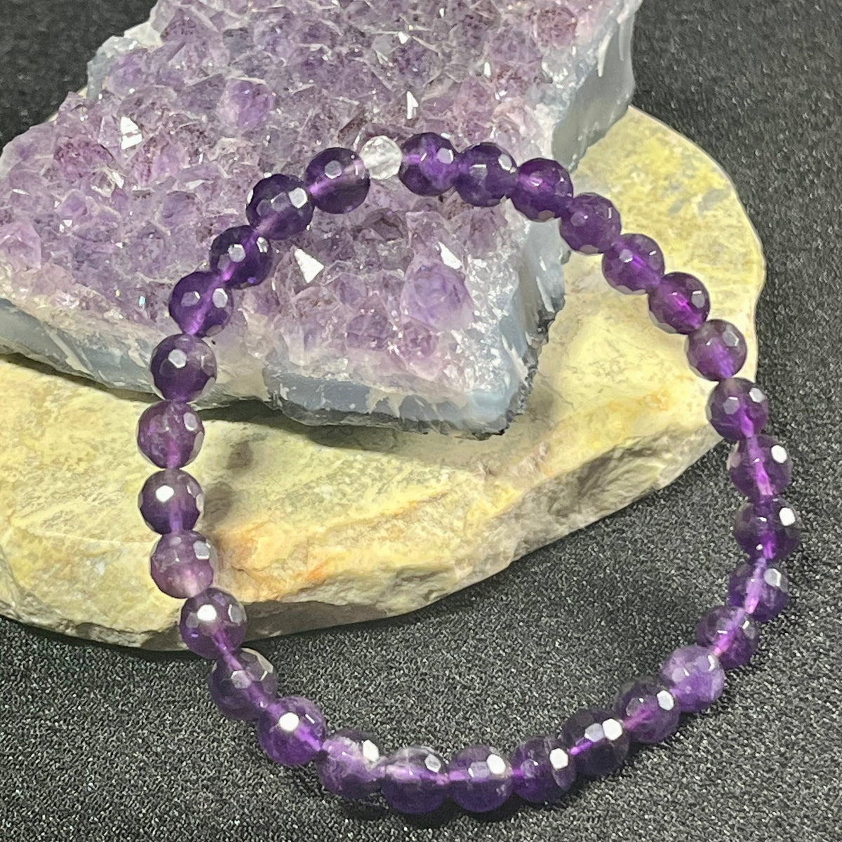 Amethyst (dark) faceted round 6mm bead stretch bracelet w/4mm microfaceted Clear Quartz spacer