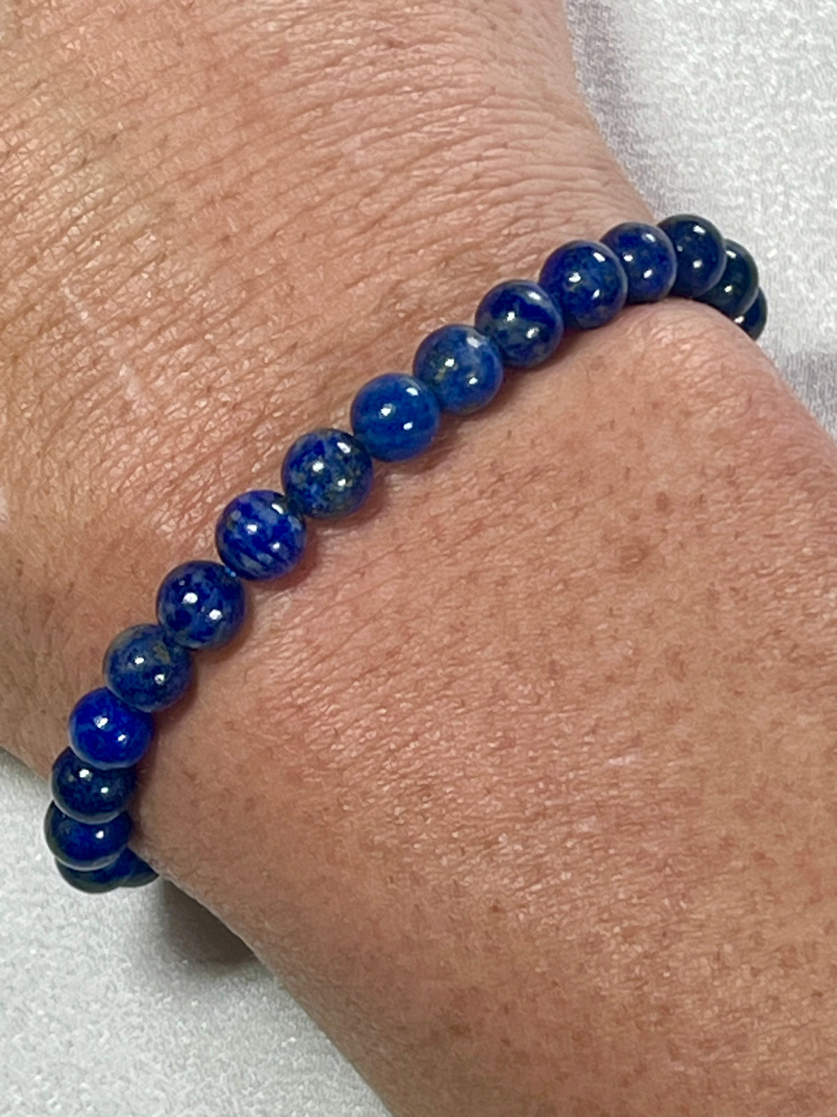 Lapis Lazuli smooth round 6mm bead stretch bracelet (A grade); alternative September birthstone